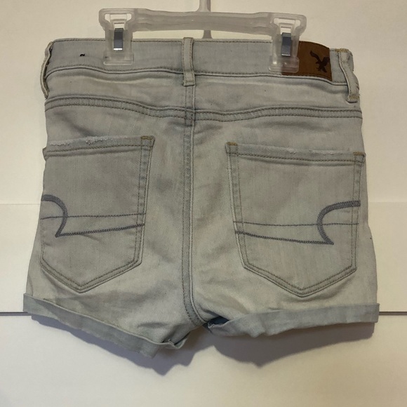Light wash high waisted denim shorts with rips - Picture 2 of 4